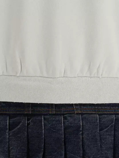 White BALENCIAGA sweatshirt dress with ribbed hem and dark blue pleated denim skirt