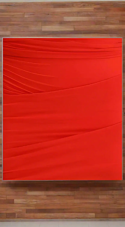 Red textured canvas artwork displayed with Balenciaga red draped short dress