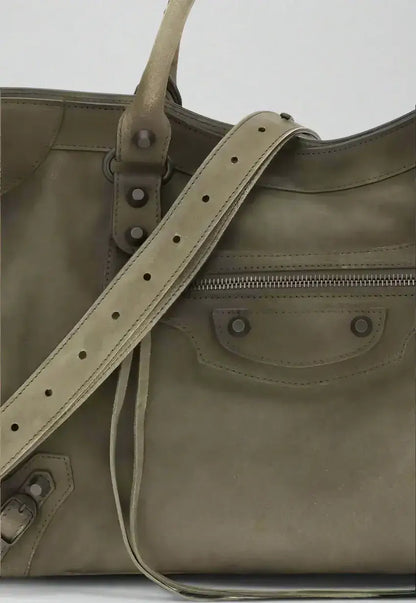 Olive green leather City Medium Handbag with adjustable strap from BALENCIAGA