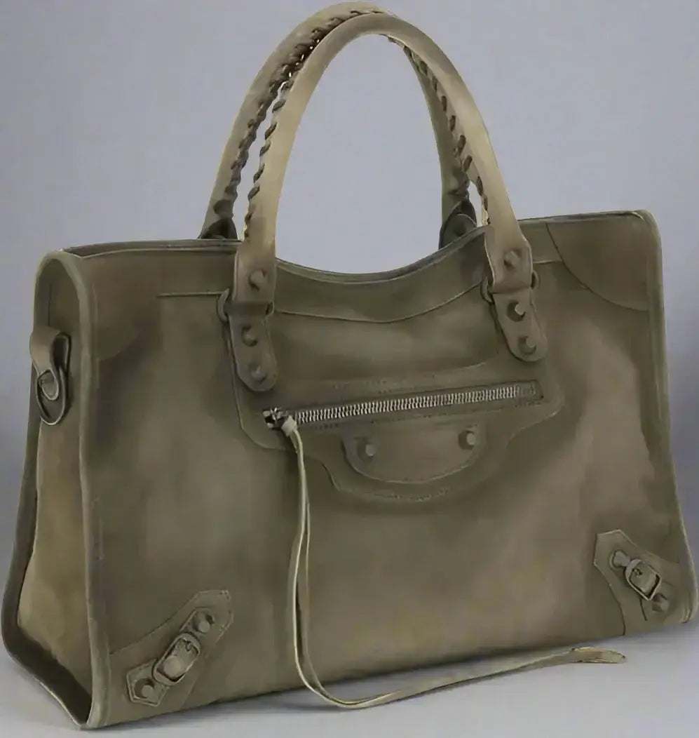 Sage green leather Balenciaga City medium handbag with braided handles and silver hardware