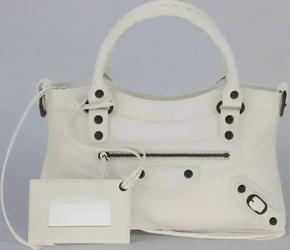 Balenciaga women’s white leather Le City First Handbag with dark hardware and zippered pocket