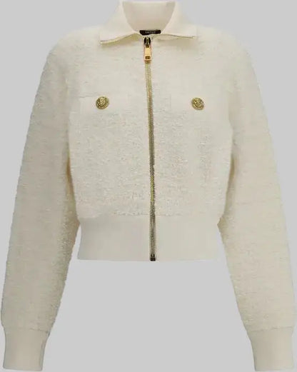 Cream-colored tweed bomber jacket with gold zipper and decorative buttons from BALMAIN