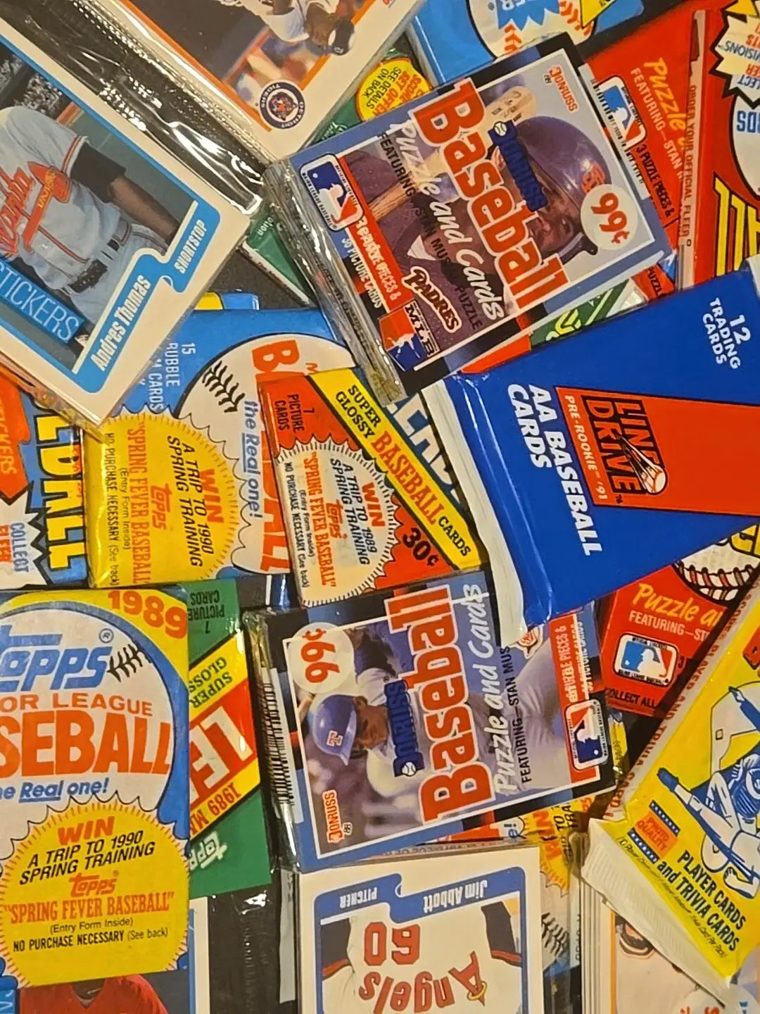Vintage baseball card packs featuring trading cards in a lot of 5 collectible baseball card packs