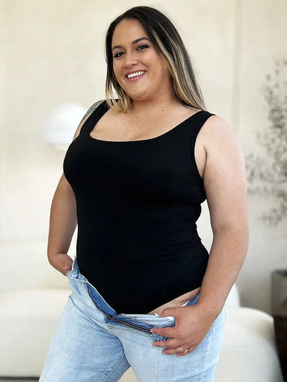 Black sleeveless square neck bodysuit with light-wash blue jeans size square neck style