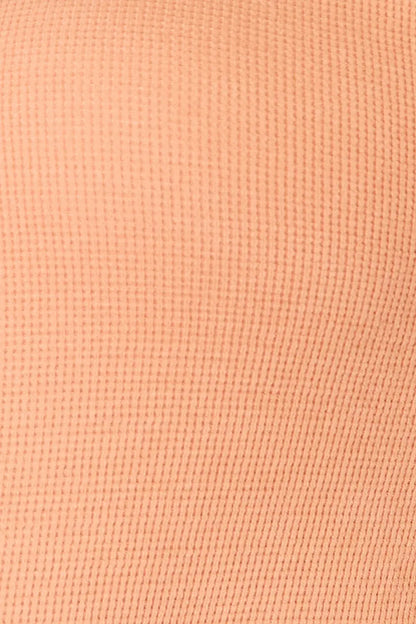 Light orange waffle-knit fabric for Basic Bae Half Button Long Sleeve Top, perfect with jeans size