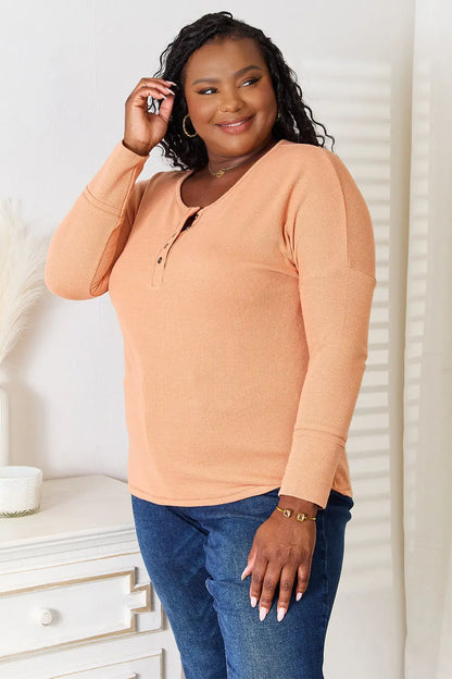 Women’s peach-colored ribbed long-sleeve henley shirt from Basic Bae Half Button Top collection
