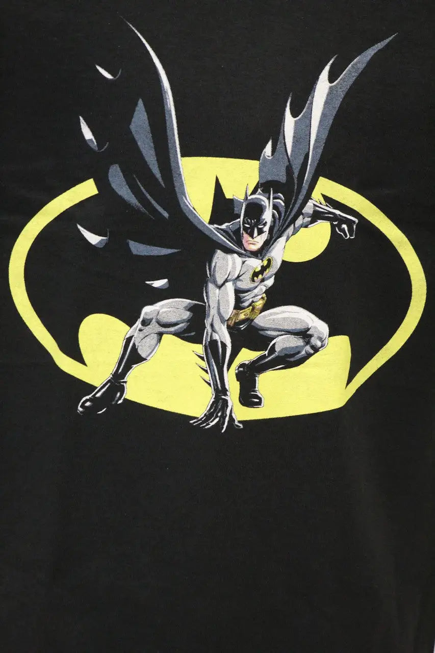 Batman crouching in action pose with yellow bat symbol for licensed DC Comics tee shirt