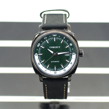 Men’s automatic watch with dark green dial and black leather strap on steel black surface