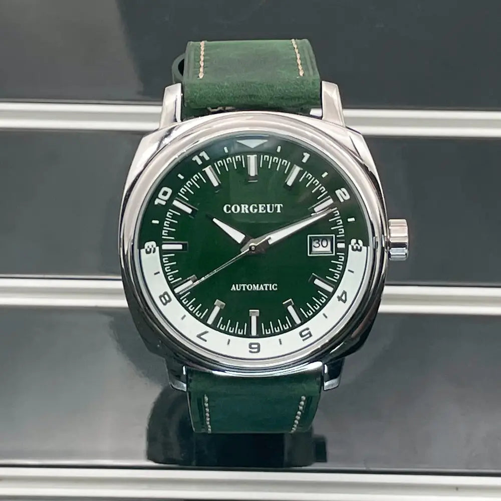 Men’s automatic watch with dark green dial, steel black surface, and date display