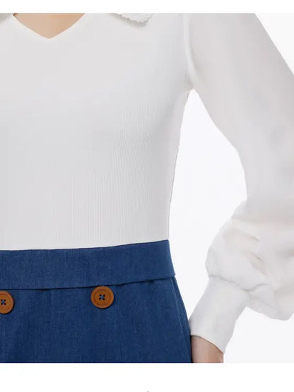 White long-sleeved ribbed knit blouse with v-neckline and blue skirt in Betty Hannah’s 1pc dress