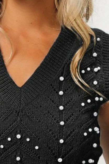 Black pearl embellished chevron pointelle knit top with v-neck and short sleeves