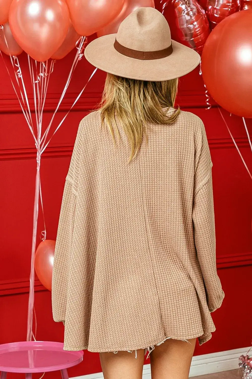Beige BiBi V-Neck Waffle Uneven Hem Top with oversized fit and wide-brimmed hat