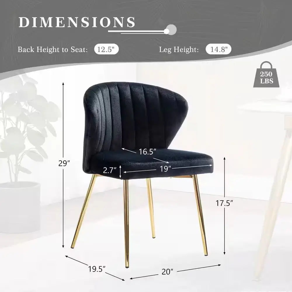 Black velvet wingback accent chair with gold metal legs and curved backrest