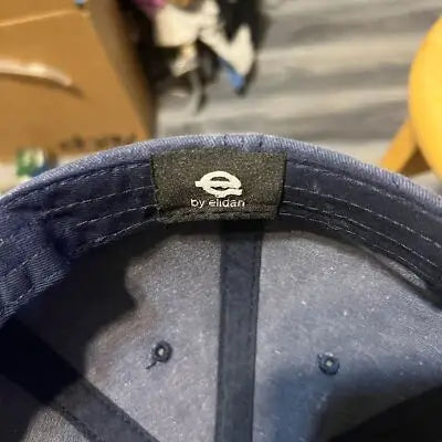 Dark blue Washington DC baseball cap with black brand tag for stylish casual wear