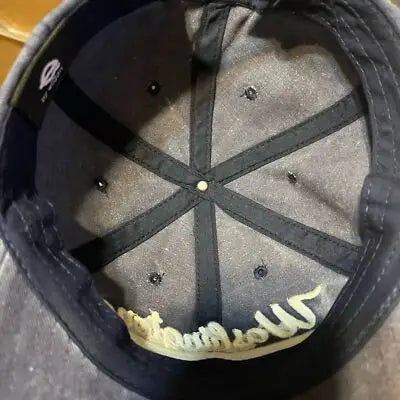 Inside view of a dark gray Blue Washington DC Hat Cap with light-colored embroidery