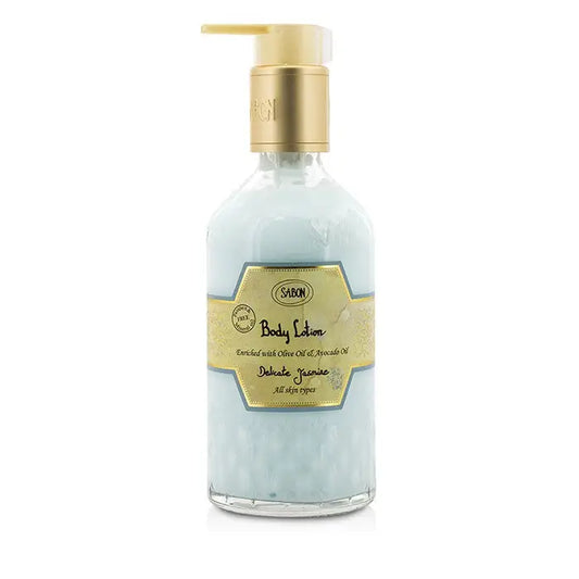 Light blue Body Lotion Delicate Jasmine in clear glass bottle with gold pump dispenser
