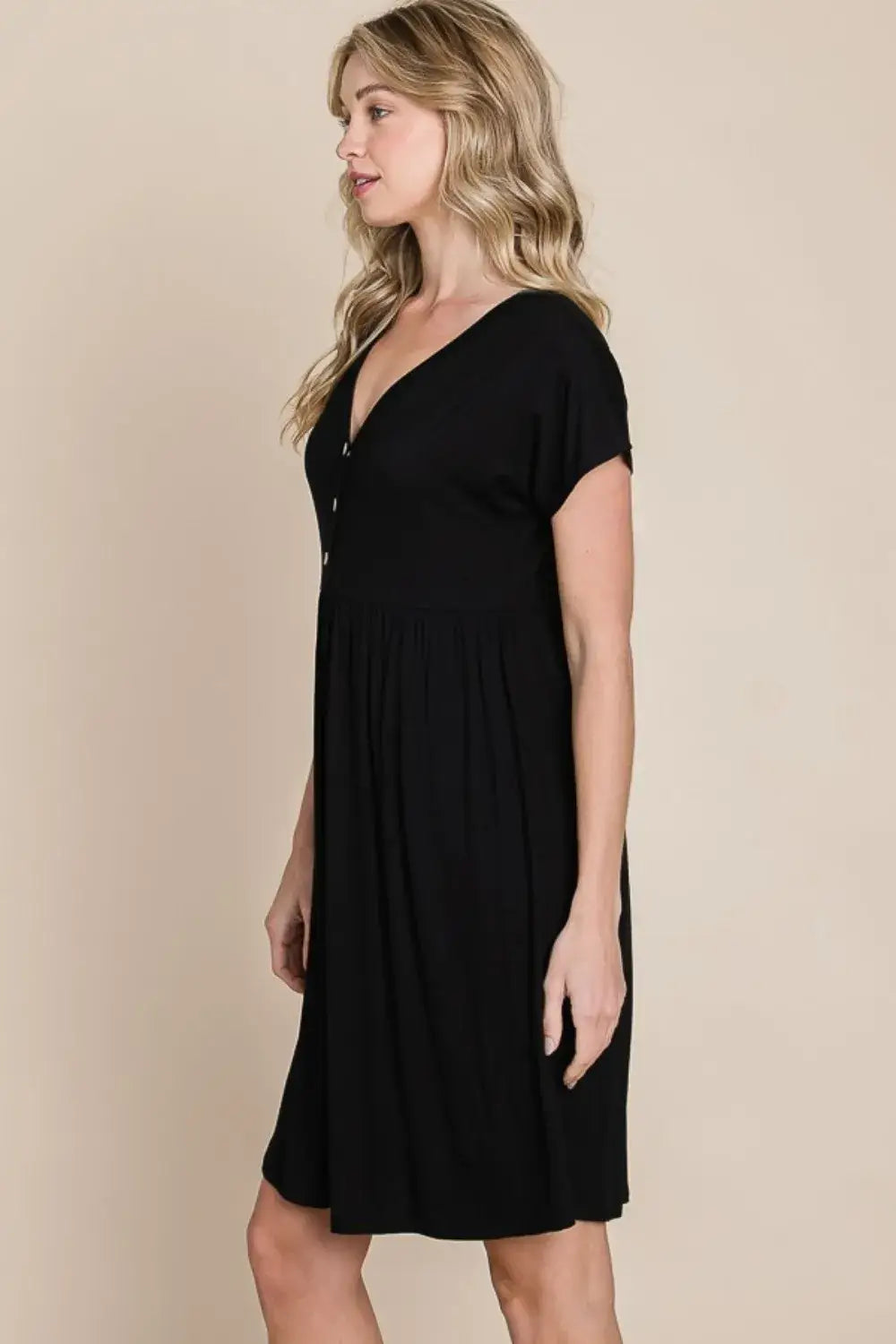 Black short sleeve dress with V-neck and empire waist made of soft rayon spandex
