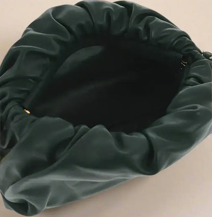 Dark green leather velvet drawstring bag from Bottega Veneta with magnetic closure