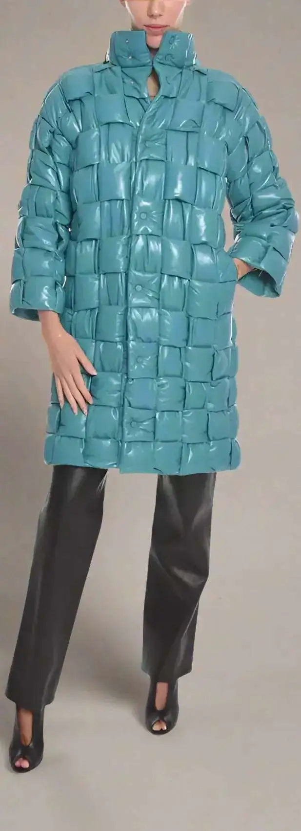 Light blue quilted intreccio leather puffer coat with high collar and three-quarter sleeves