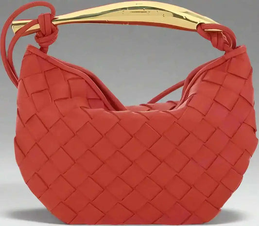 Bottega Veneta Muse Bag with vibrant red woven leather and curved brass handle