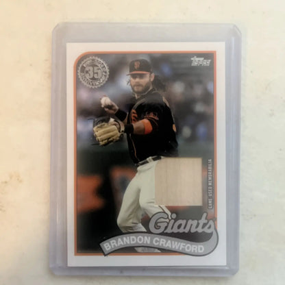 Brandon Crawford baseball card featuring a piece of game-used bat for collectors