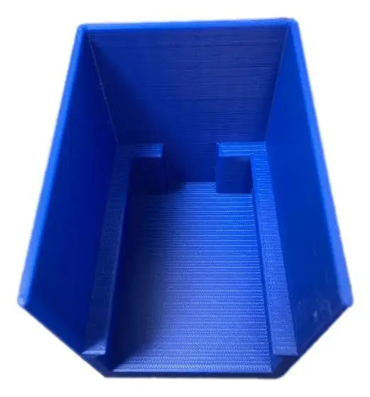 Blue 3D-printed Break Buddy container with internal rails for penny sleeves