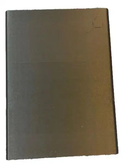 Break Buddy penny sleeve holder featuring a dark gray metallic-looking sheet with surface imperfections