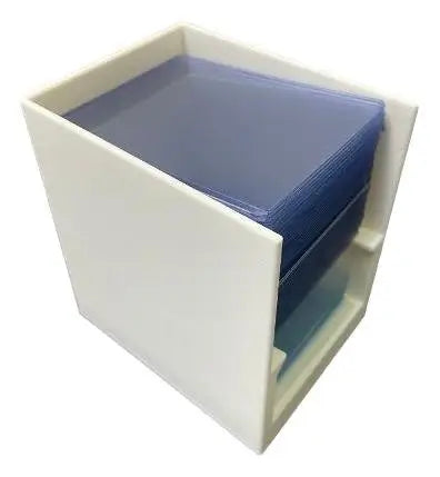 White plastic Break Buddy storage box with two compartments filled with blue penny sleeves