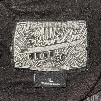 Black T-shirt with embroidered label from Brooklyn Cloth MFG, size large