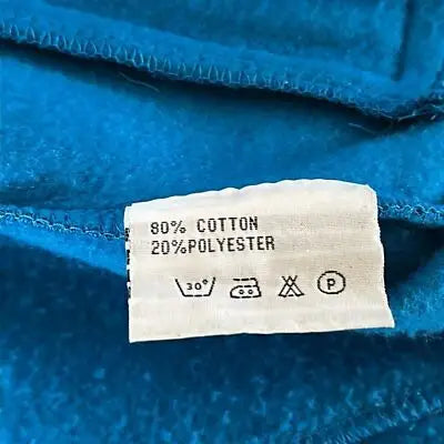 Clothing care label with fabric composition on Brooks Boys Blue Full Zip Hoodie