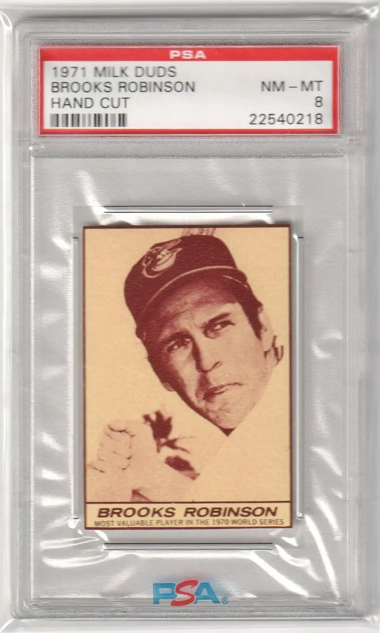 Graded 1971 Brooks Robinson Milk Duds baseball card from Columbia Hobby, ESPNU Magazine covers