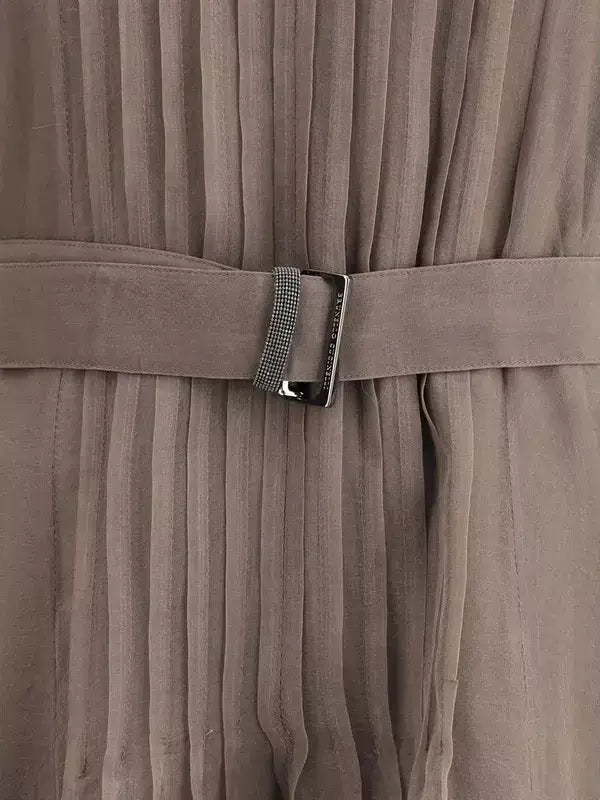 Taupe silk long dress with pleats, matching belt, and silver buckle from Brunello Cucinelli
