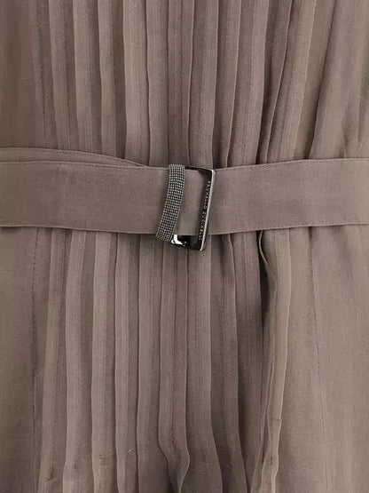 Taupe silk long dress with pleats, matching belt, and silver buckle from Brunello Cucinelli