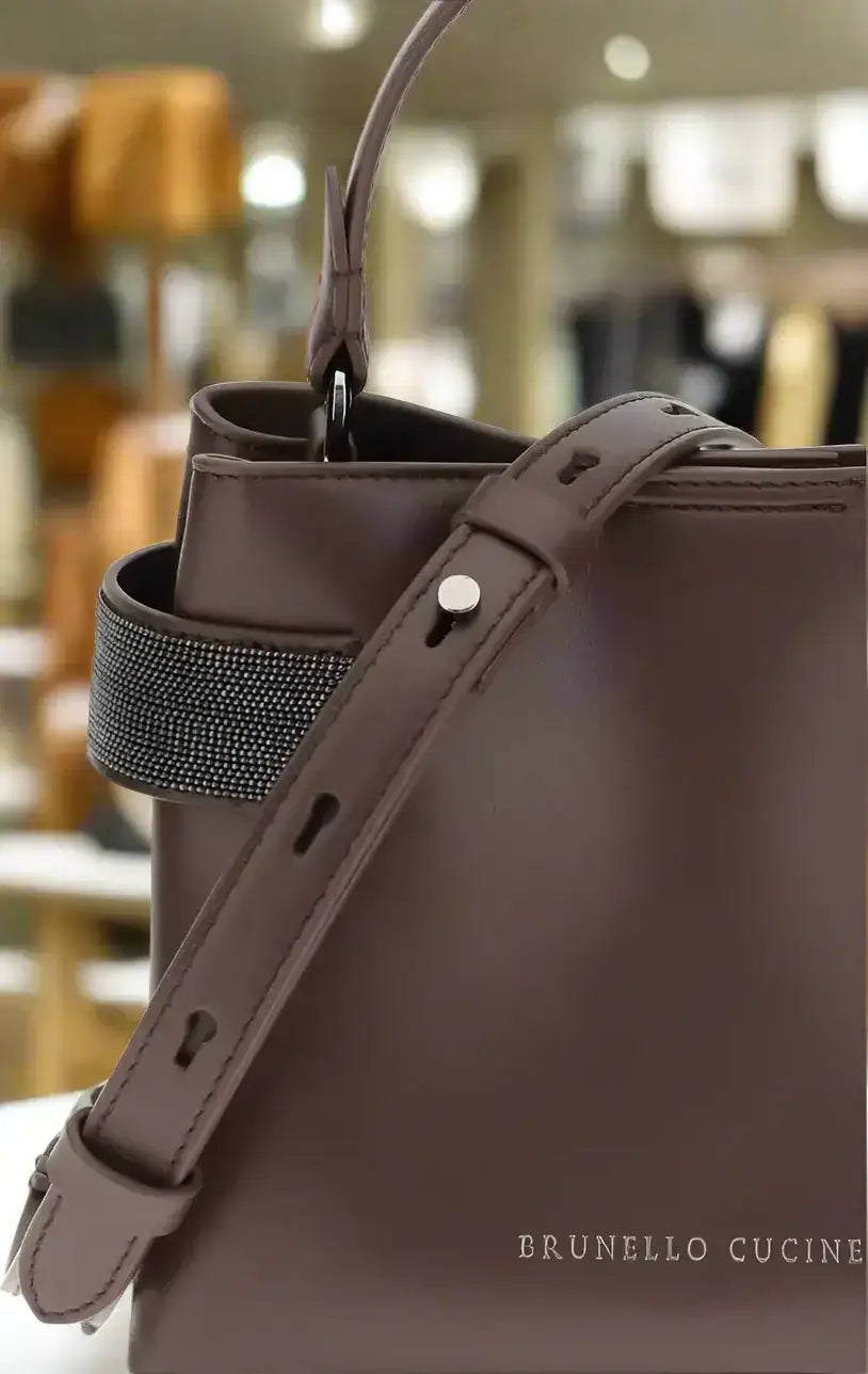 Brunello Cucinelli leather handbag with embellished strap and removable interior pocket
