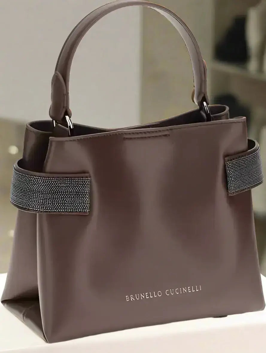 Brunello Cucinelli leather handbag with top handle and sparkling side accents