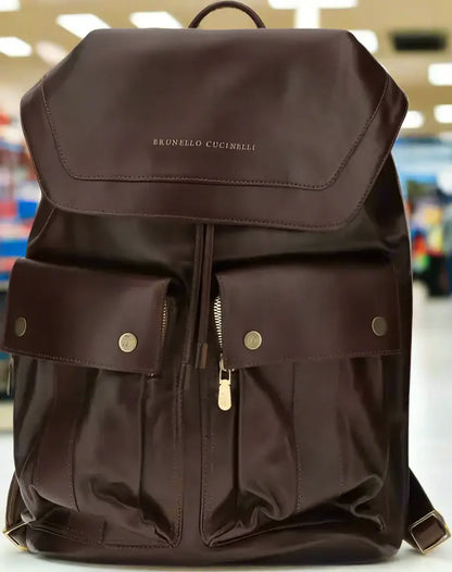 Dark brown leather backpack with flap closure and front pockets for Brunello Cucinelli mens