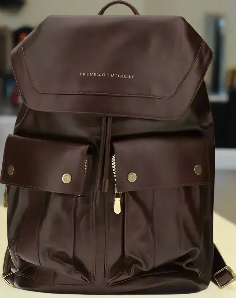 Brunello Cucinelli Mens leather backpack with flap closure drawstring and gold hardware