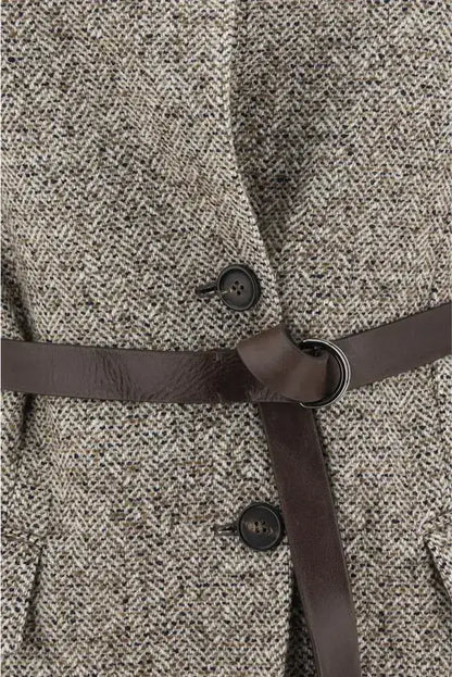 Brown and white herringbone wool gilet with dark brown leather belt for women