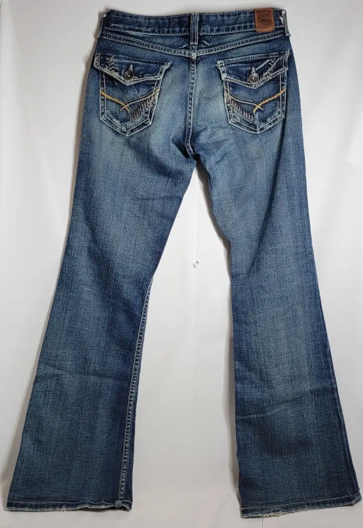 Blue denim flared jeans with embroidered back pockets from Buckle BKE Denim Sabrina size 28 x 29