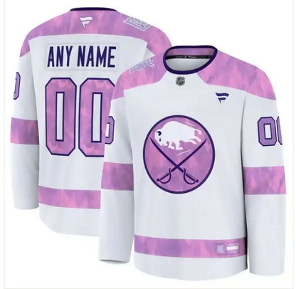 White and pink Buffalo Sabres Hockey Fights Cancer practice jersey displayed front view
