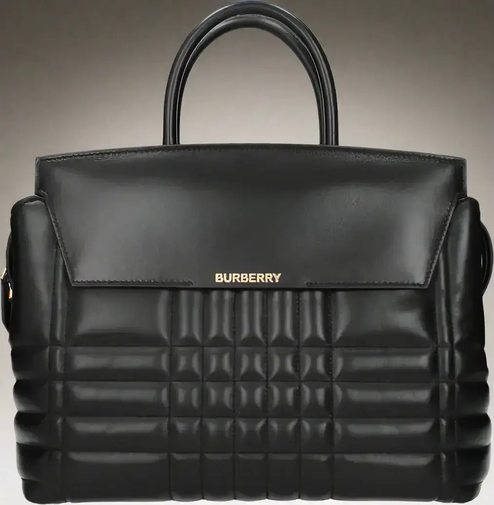Black leather quilted handbag with top handles and front flap from BURBERRY women