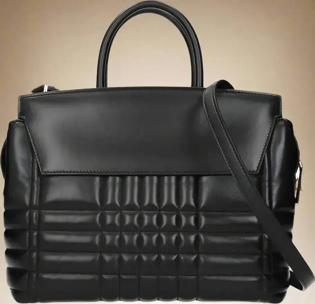 Black leather handbag with quilted textured bottom and top handle for BURBERRY women