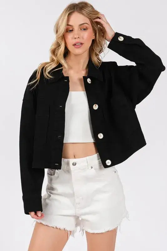 Black cropped denim jacket with silver buttons and frayed hem from bytos button collection