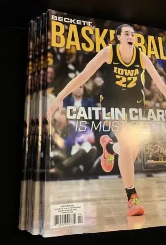 Stack of Caitlin Clark Beckett Basketball magazines for April 2024 Price Guide