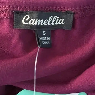 Maroon Camellia dress size small with black brand tag, made in China, elegant party wear