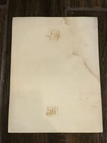 Stained off-white surface of Carol Vadnais Linnett Hockey lithograph portrait etching