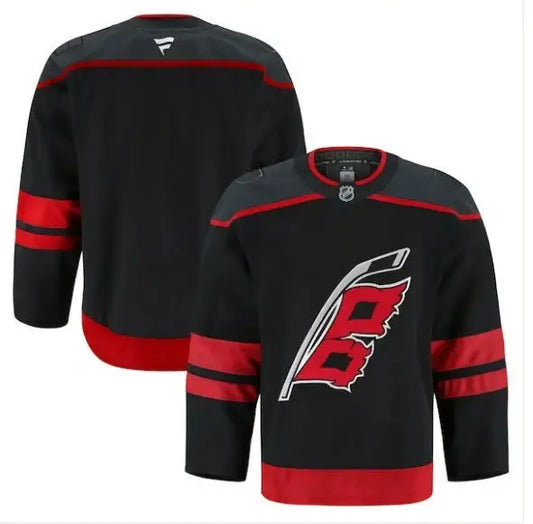 Black and red Carolina Hurricanes home authentic pro hockey jersey displayed on a product page