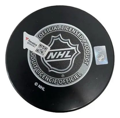Carter Hart autographed NHL puck with league logo for hockey trading cards collectors
