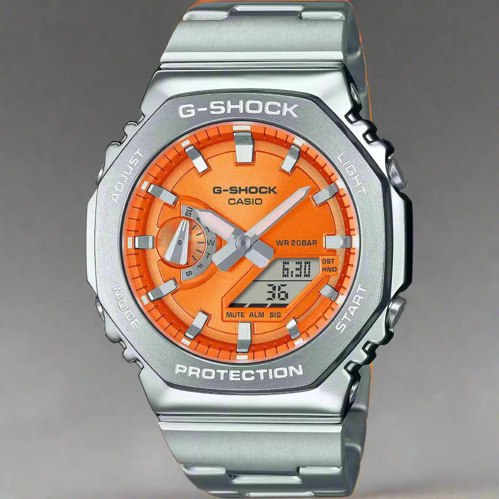 Casio men’s orange G-SHOCK watch with metal band, world time, and hourly signal