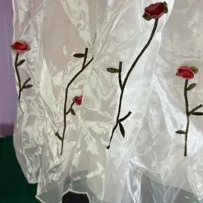 White sheer fabric with embroidered red roses and green stems for Cassies Creations Red Velvet Empire Waist Dress